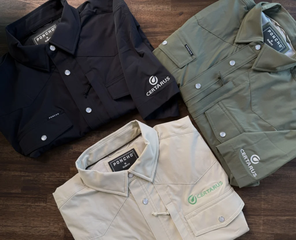 Button-up work shirts with embroidered Certarus logo on chest and sleeve