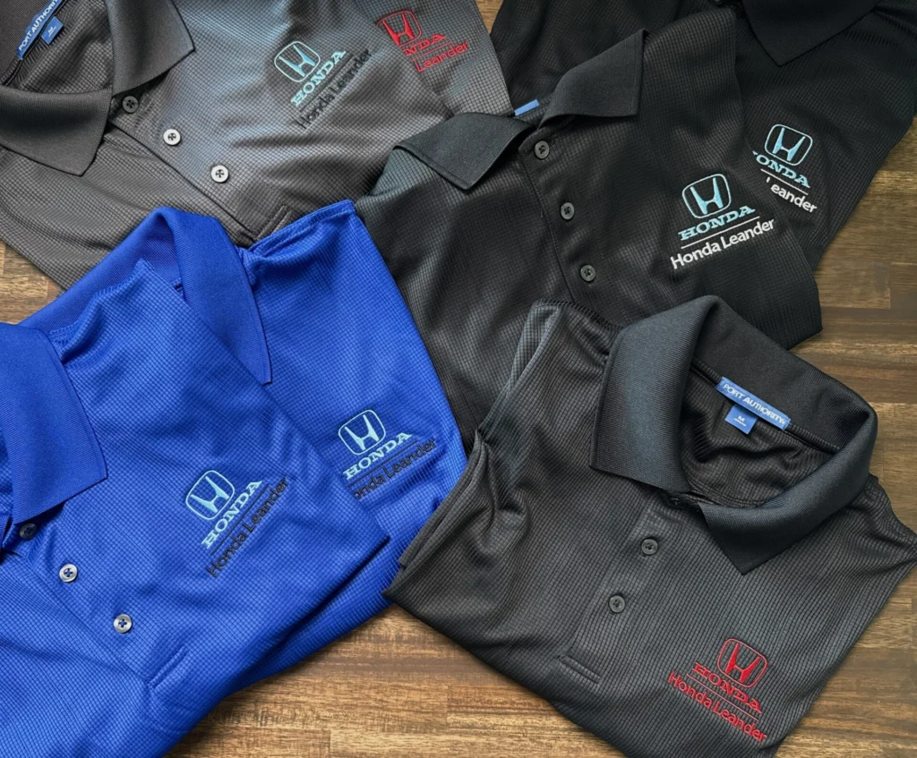 Employee polos in several colors with embroidered Honda Leander logo