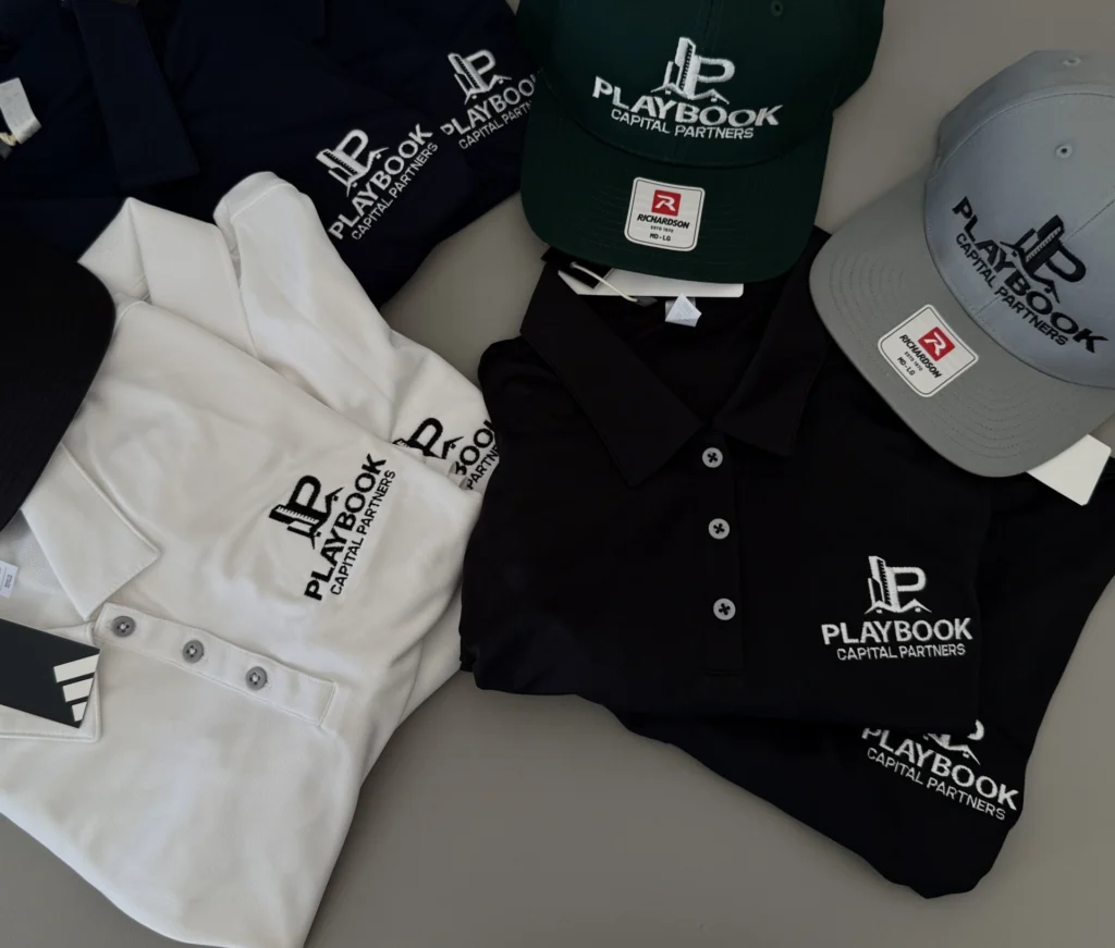 Embroidered polos and caps for Playbook Capital Partners in Cedar Park, TX